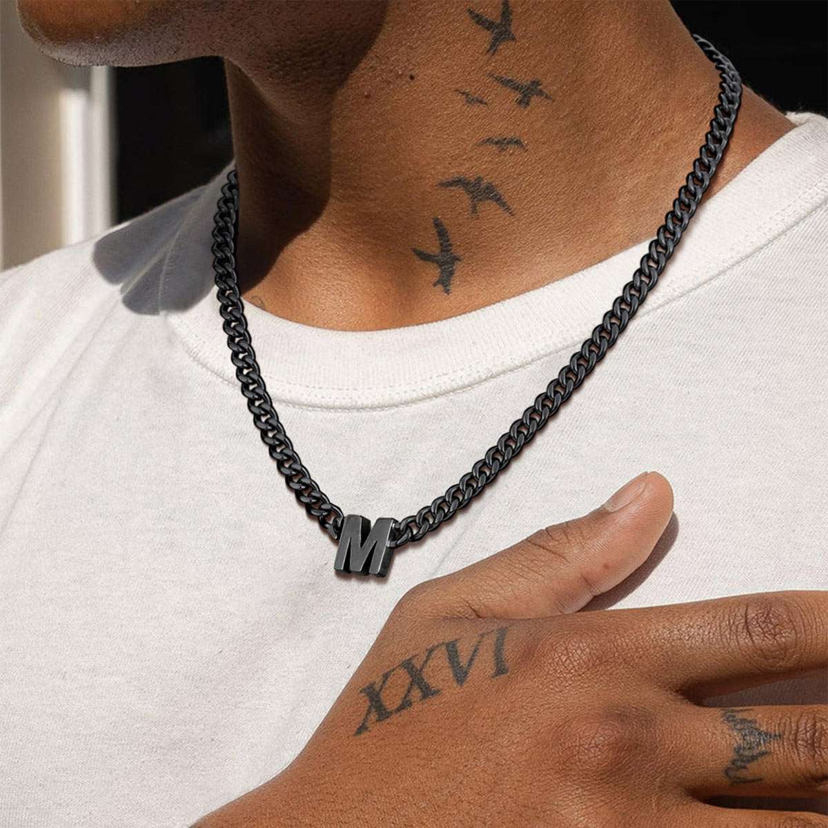A Man Wearing Initial Cuban Chain Necklace