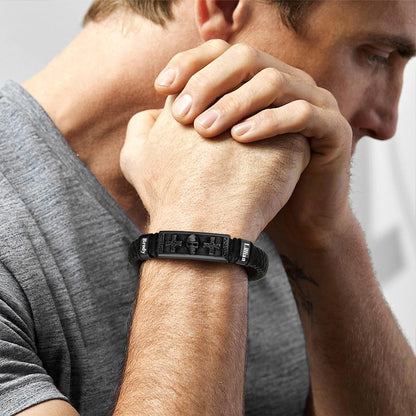 A Man Wearing Leather Skull Cross Bracelet