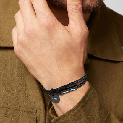 A Man Wearing Name Plate Leather Bracelet 