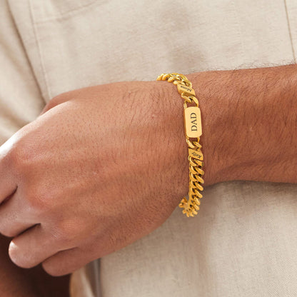 A Man Wearing Names Cuban Chain Bracelet