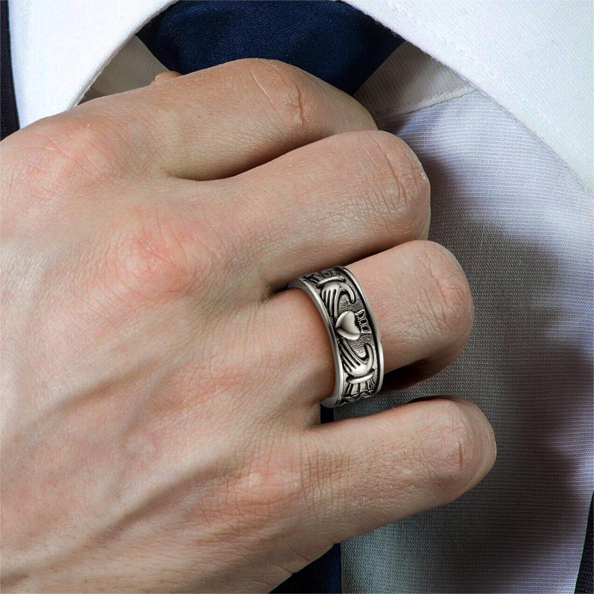 A Man Wearing Personalized Claddagh Promise Rings