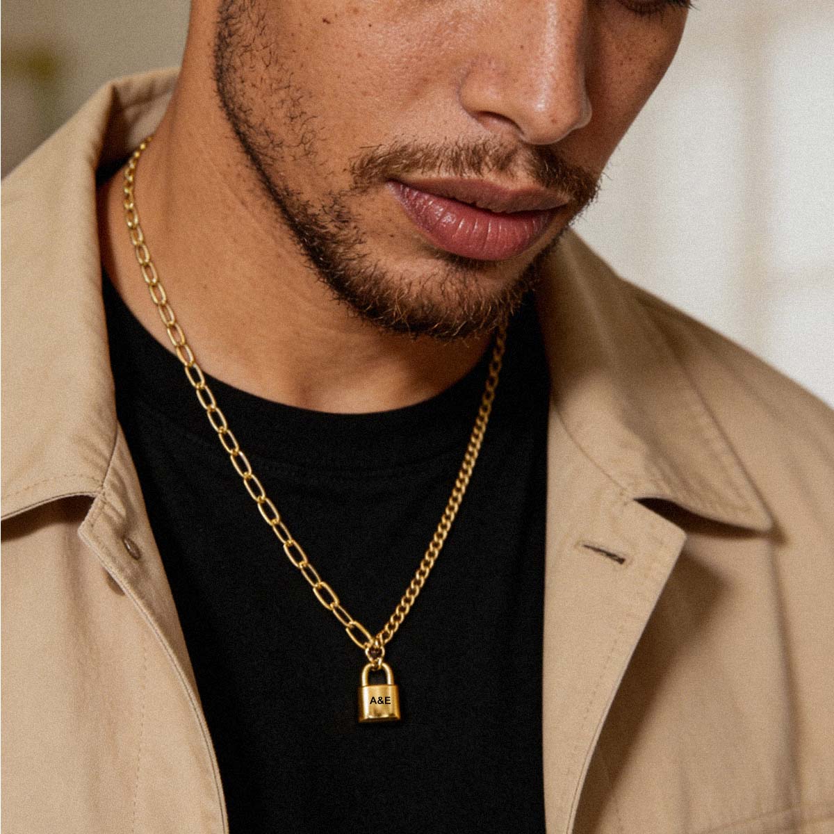 A Man Wearing Personalized Lock Necklace