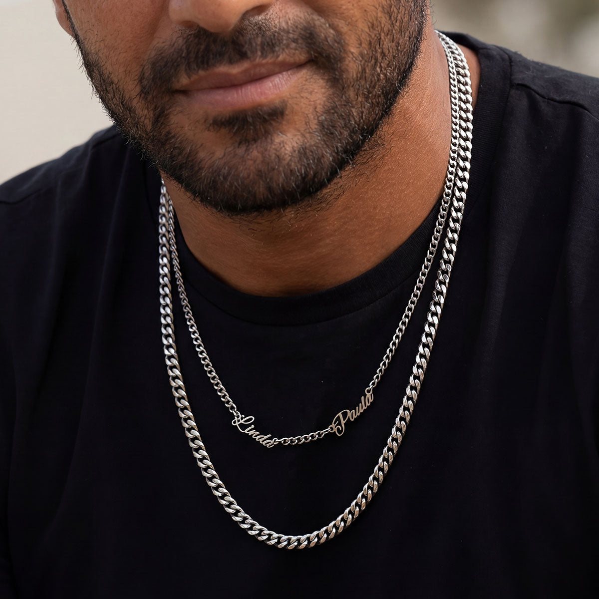 A Man Wearing Personalized Multi Nameplate Cuban Link Necklace