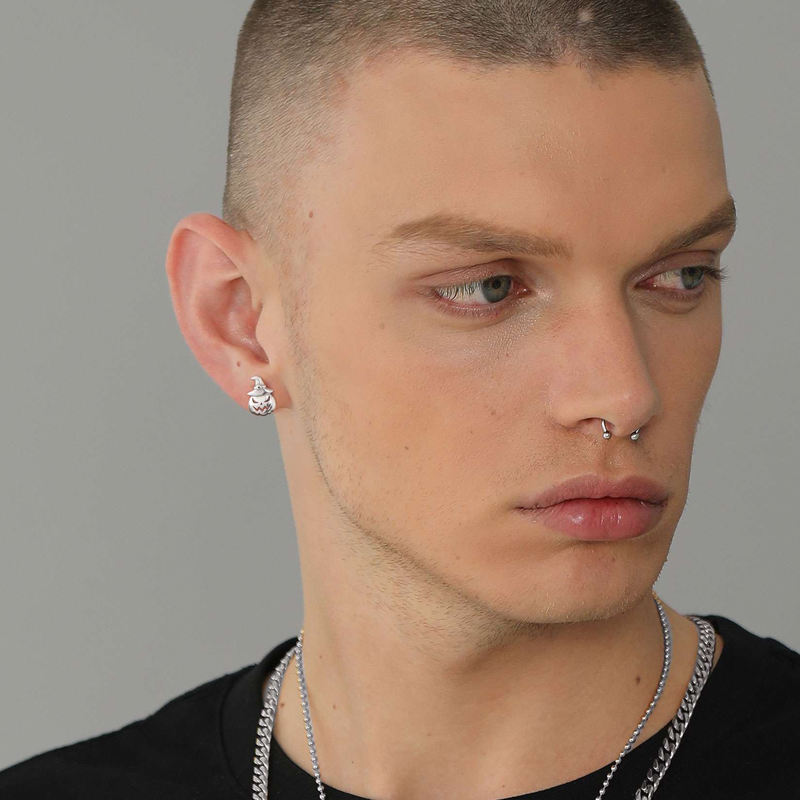 A Man Wearing Skull of Jack Stud Earrings in 925 Sterling Silver
