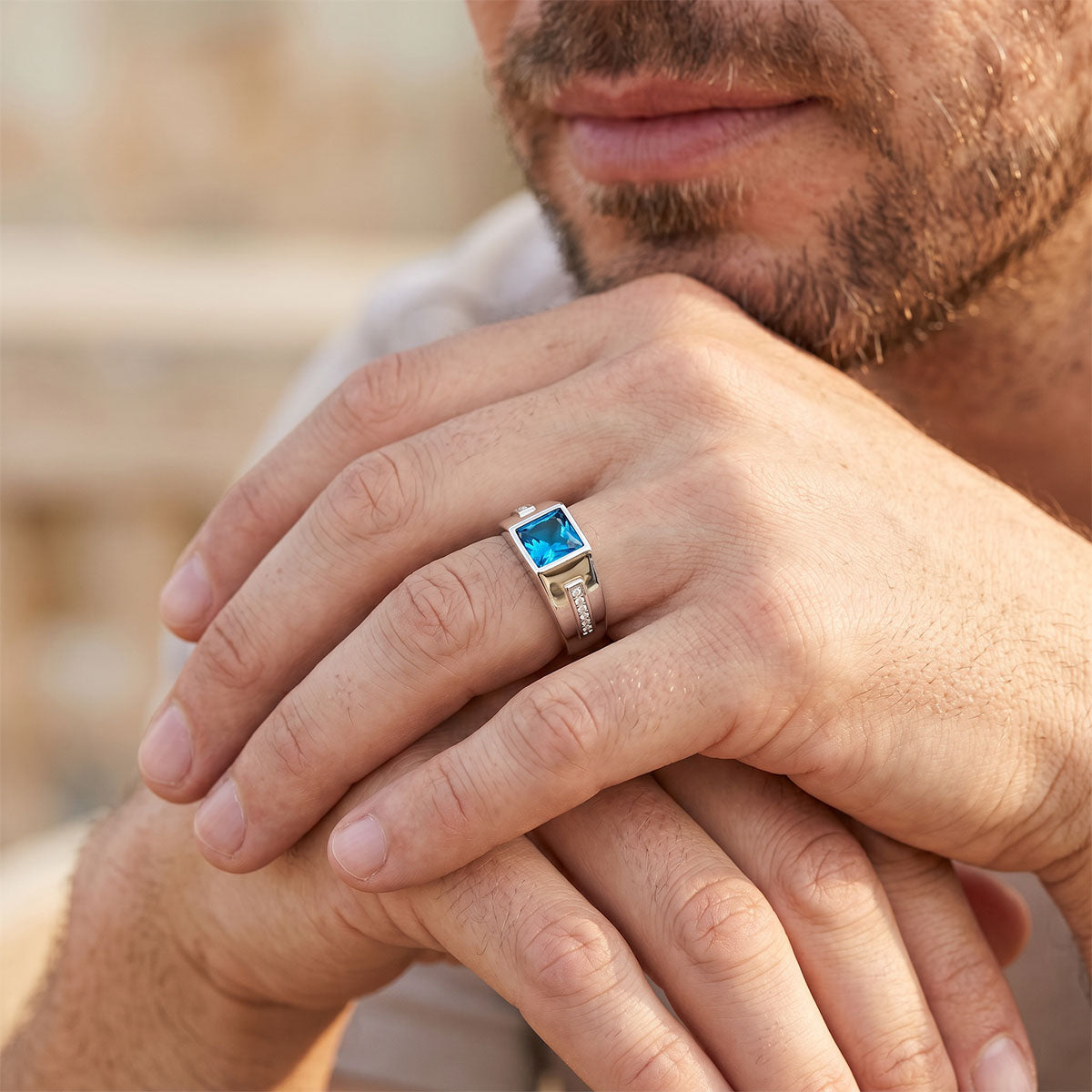 A Man Wearing Sterling Silver Custom Birthstone Signet Band Ring 