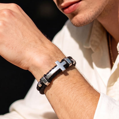 A Man in white shirt Wearing Black Braided Leather Bracelet with Stainless Steel Cross