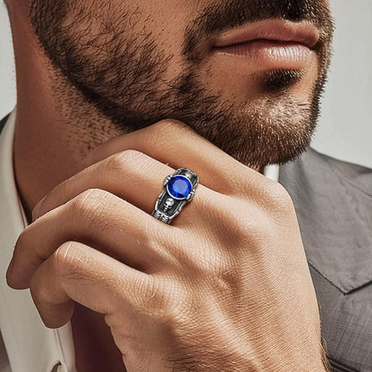 A Man wearing skull birthstone band ring