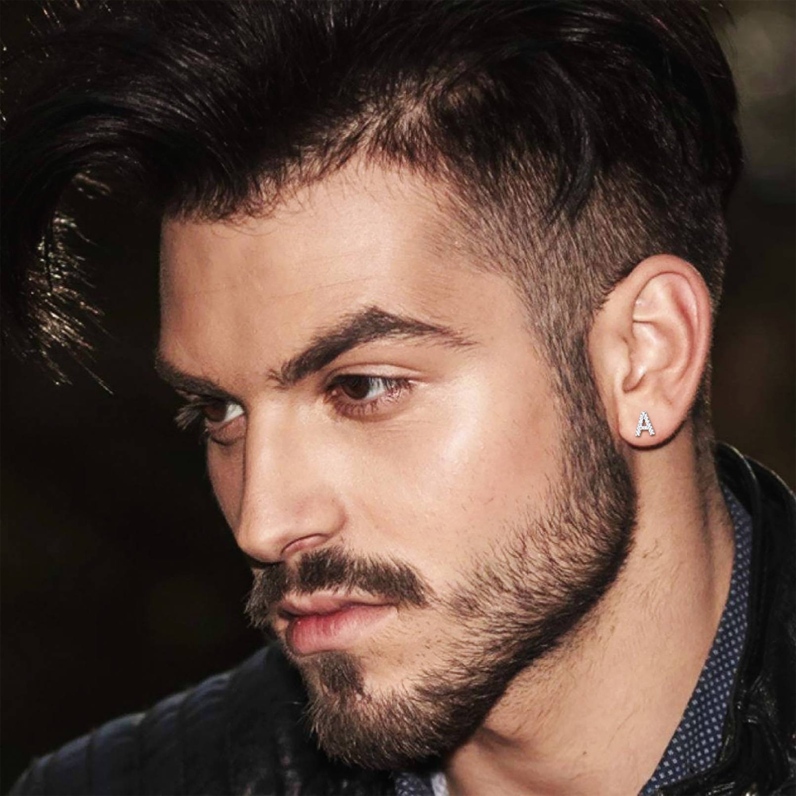 A Men Wearing 925 Sterling Silver CZ Initial Stud Earrings