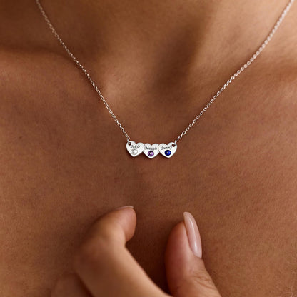 A Woman Wearing 3 Hearts Name Birthstone Necklace