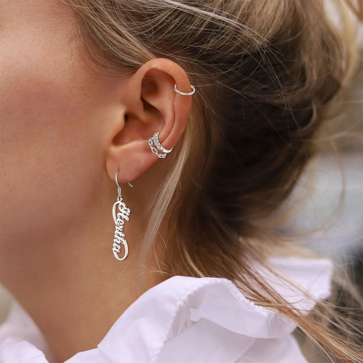 A Woman Wearing 4Pcs Ear Cuffs Earrings Set Non Piercing