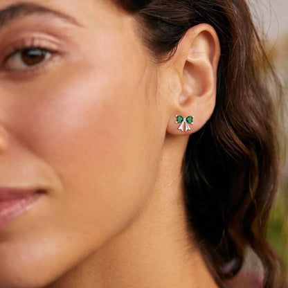 A Woman Wearing  Bow Birthstone Earrings