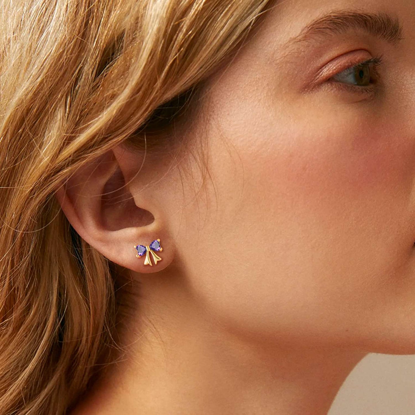 A Woman Wearing  Bow Birthstone Stud Earrings for Women