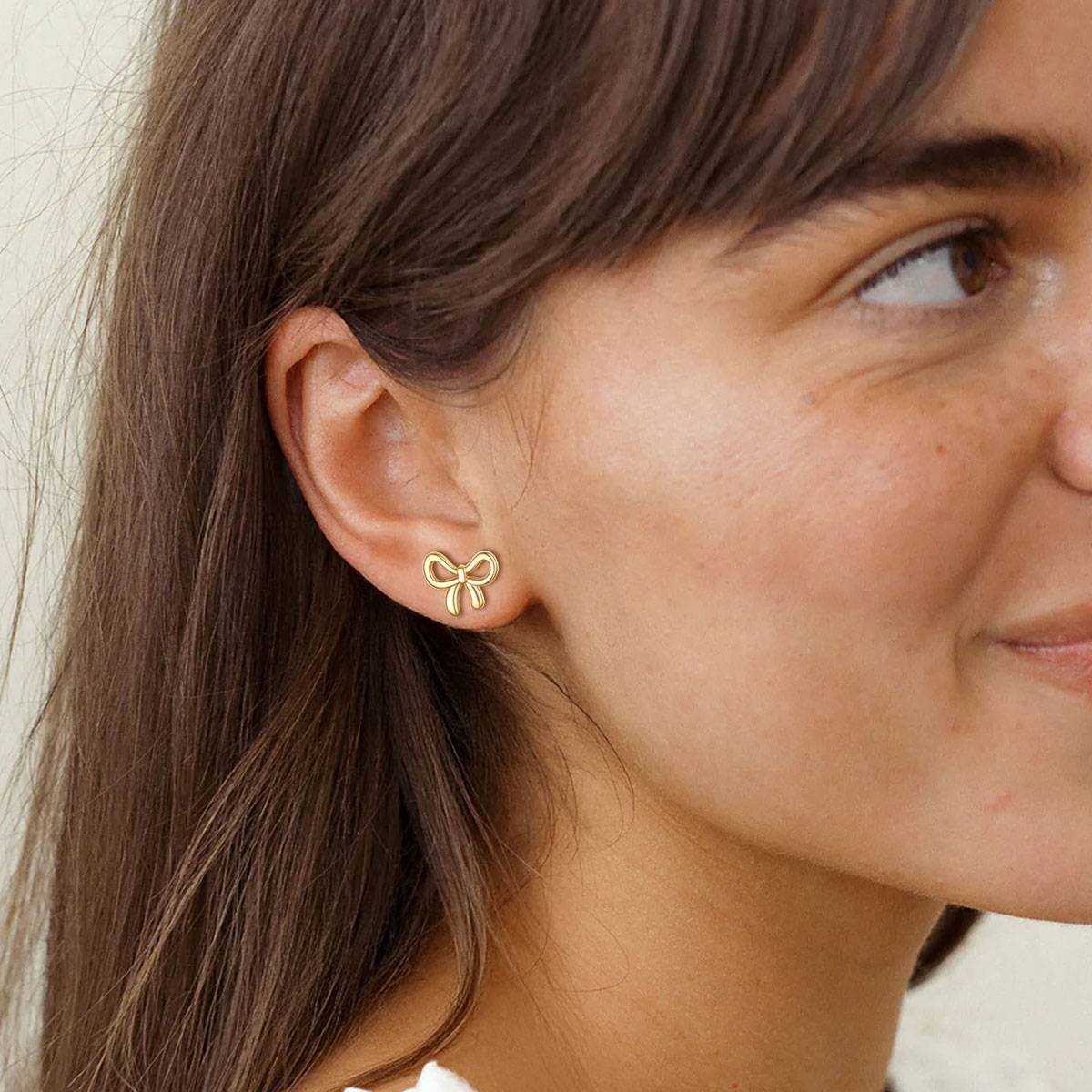 A Woman Wearing Bow Ribbon Studs Earring for Women