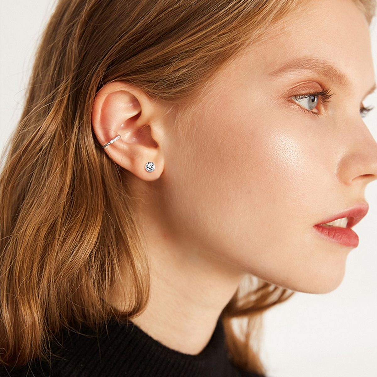A Woman Wearing CZ Ear Cuff Clip on Earrings