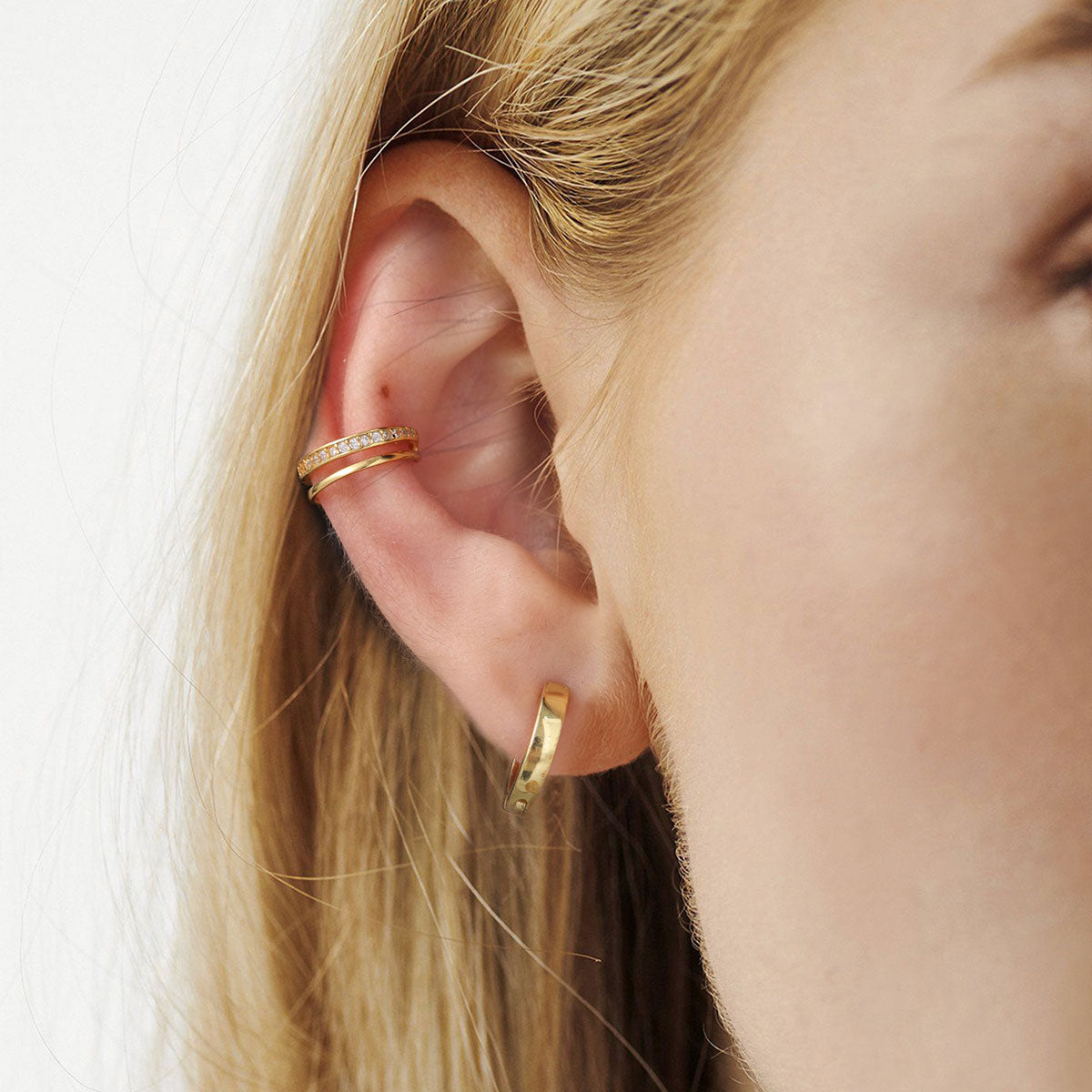 A Woman Wearing CZ Ear Cuff Earrings Clip On Earrings