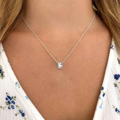 A Woman Wearing CZ Necklace
