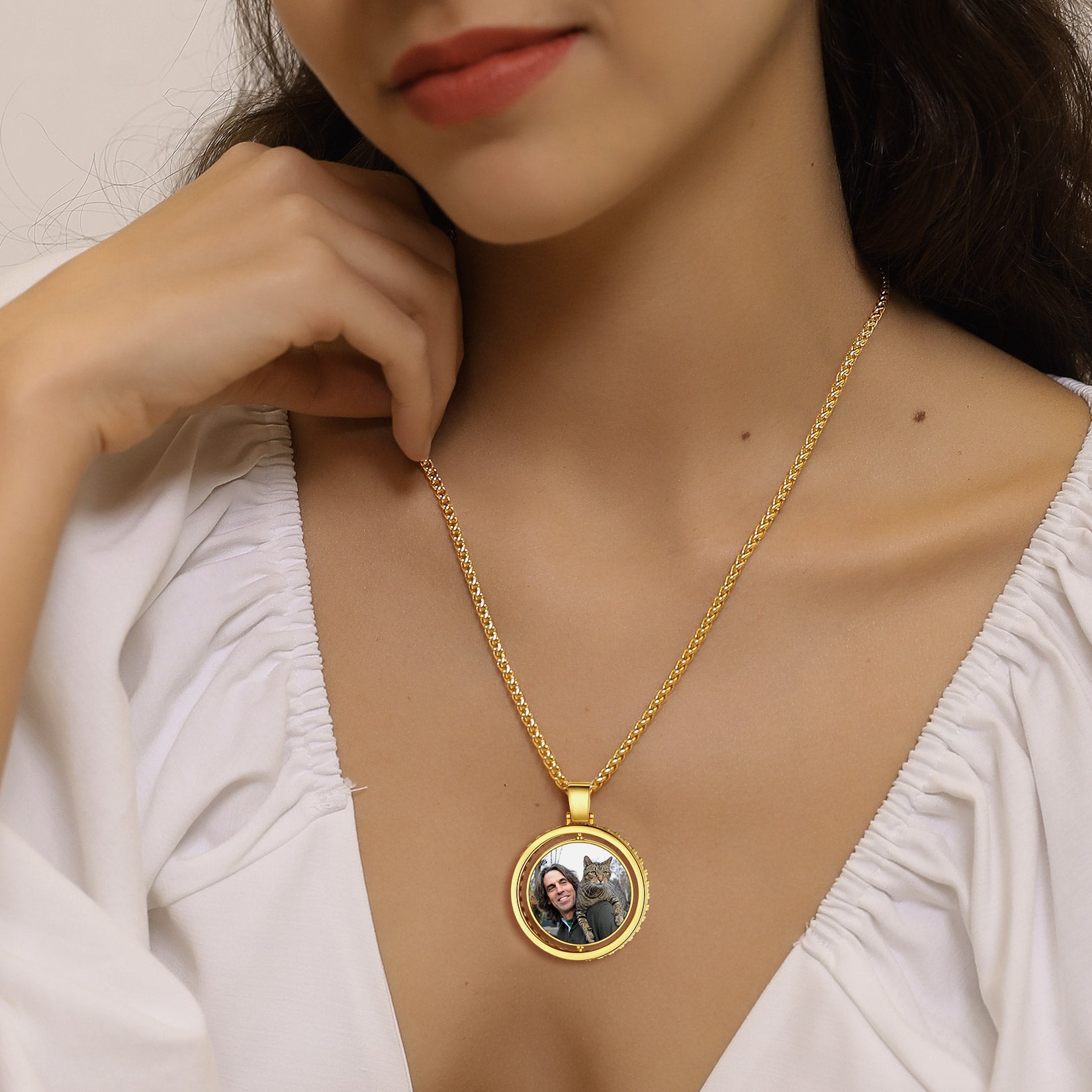 A Woman Wearing CZ double sided picture necklace