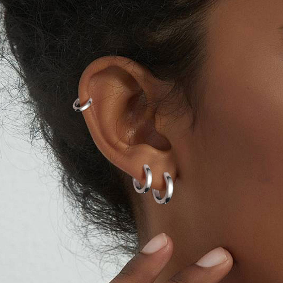 A Woman Wearing Clasice Huggie Earrings Set for Women Men