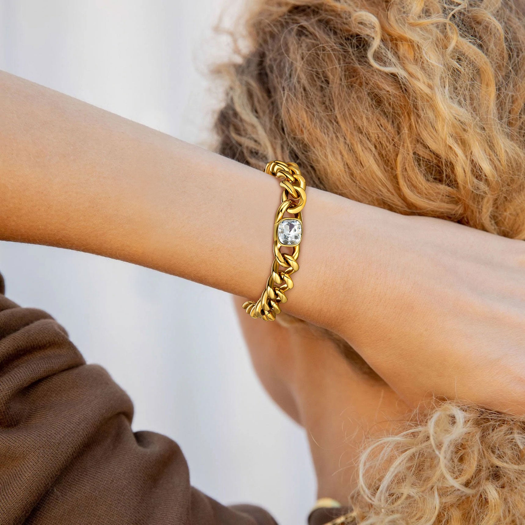 A Woman Wearing Cuban Link Birthstone Bracelet