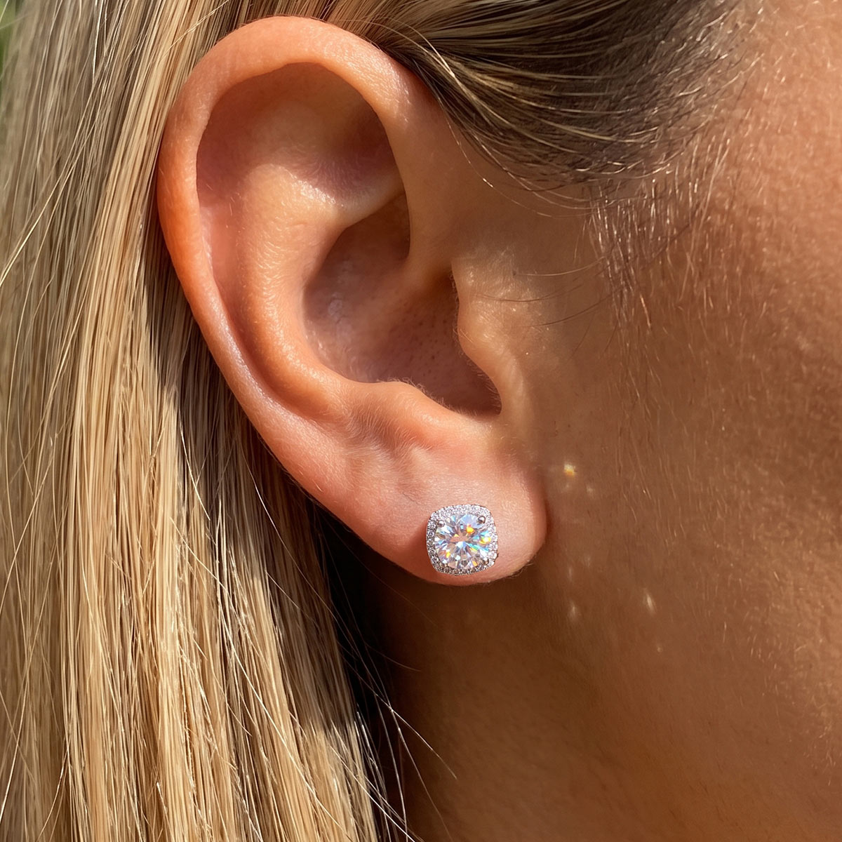 A Woman Wearing Cubic Zirconia Halo Stud Earrings
