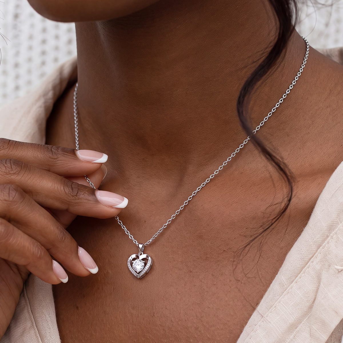 A Woman Wearing Cubic Zirconia Heart Pendant Necklace