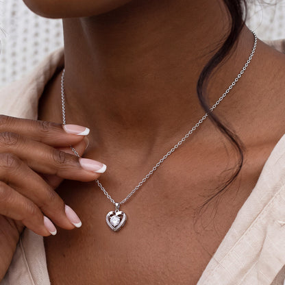 A Woman Wearing Cubic Zirconia Heart Pendant Necklace
