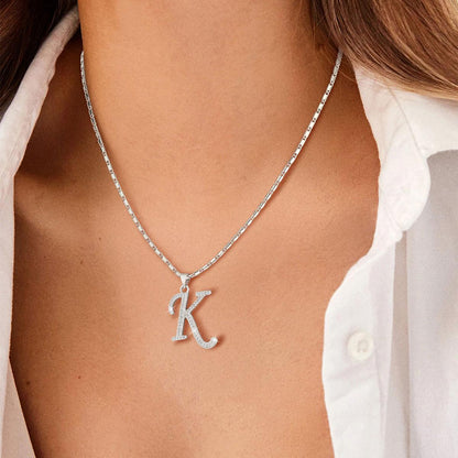 A Woman Wearing Cubic Zirconia Initial Necklace