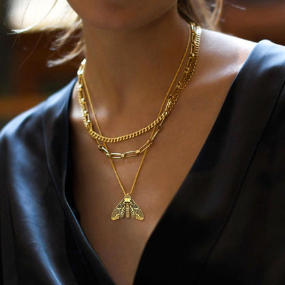 A Woman Wearing Custom Death Head Moth Skull Necklace
