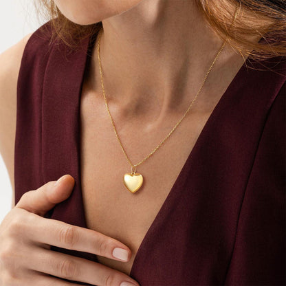 A Woman Wearing Custom Heart Locket Necklace with Pictures