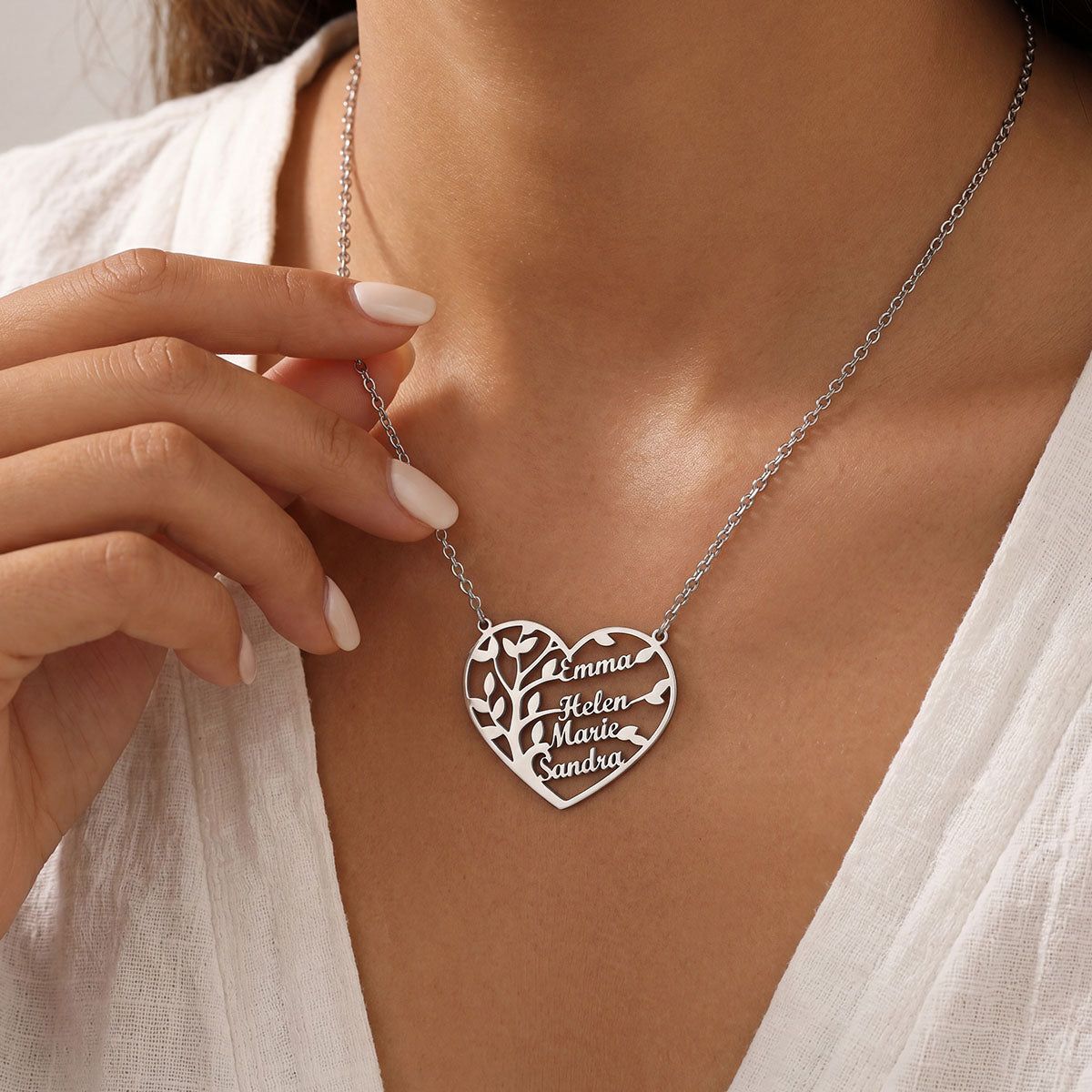 A Woman Wearing Custom Heart Tree of Life Heart Necklace with Names