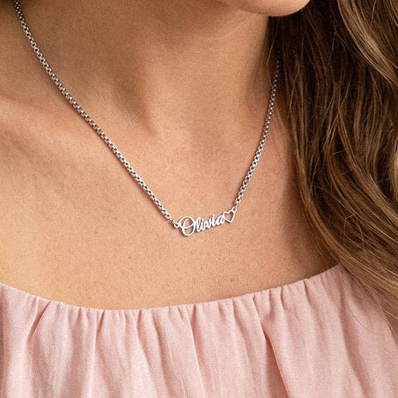 A Woman Wearing Custom Name Box Chain Necklace with Tiny Heart Steel