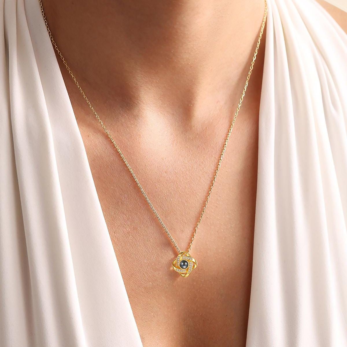 A Woman Wearing Custom Quadruple Love Knot Photo Projection Necklace