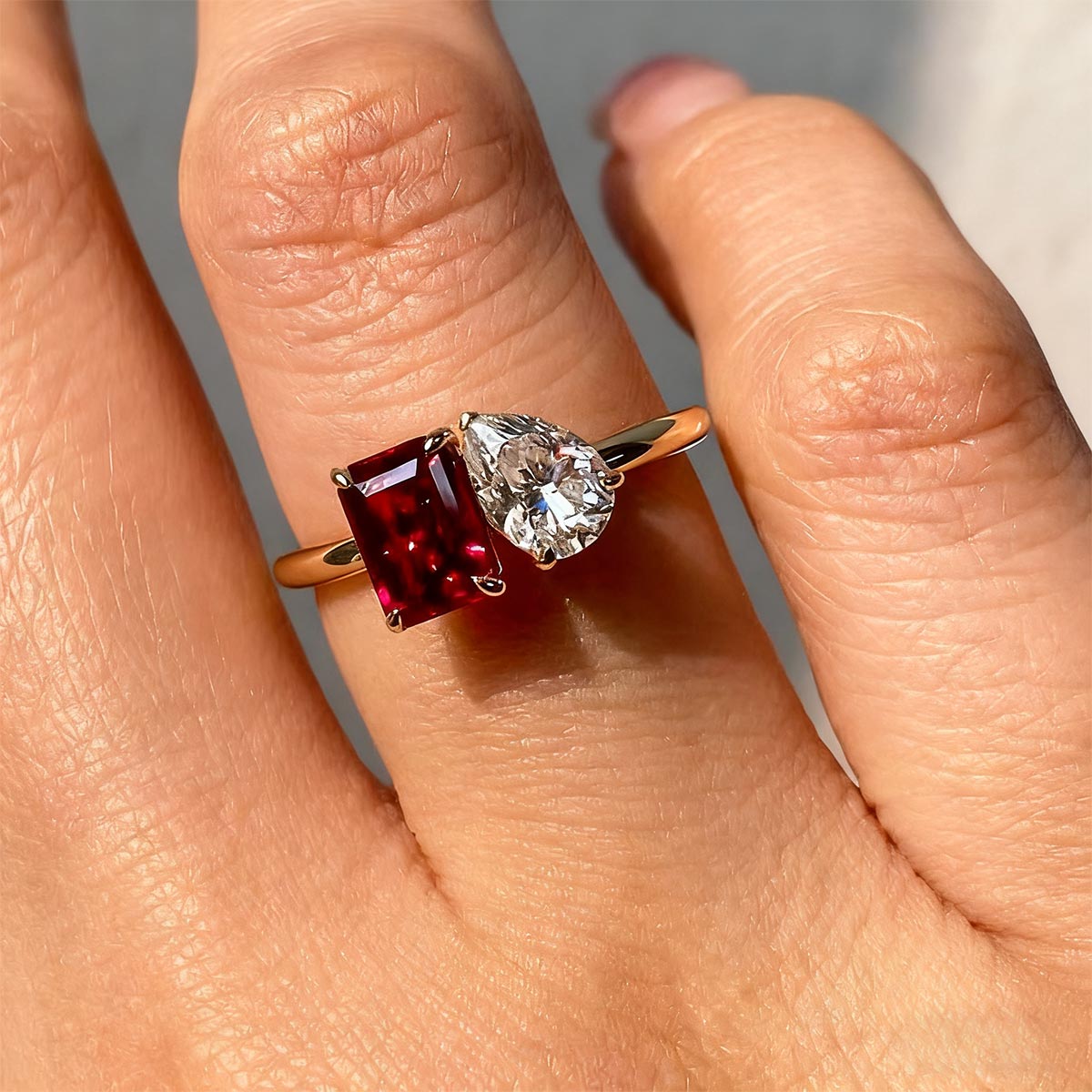 A Woman Wearing Custom Toi et Moi Birthstone Ring