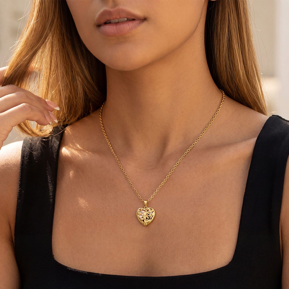 A Woman Wearing Custom Tree of Life Heart Locket Picture Necklace Gold