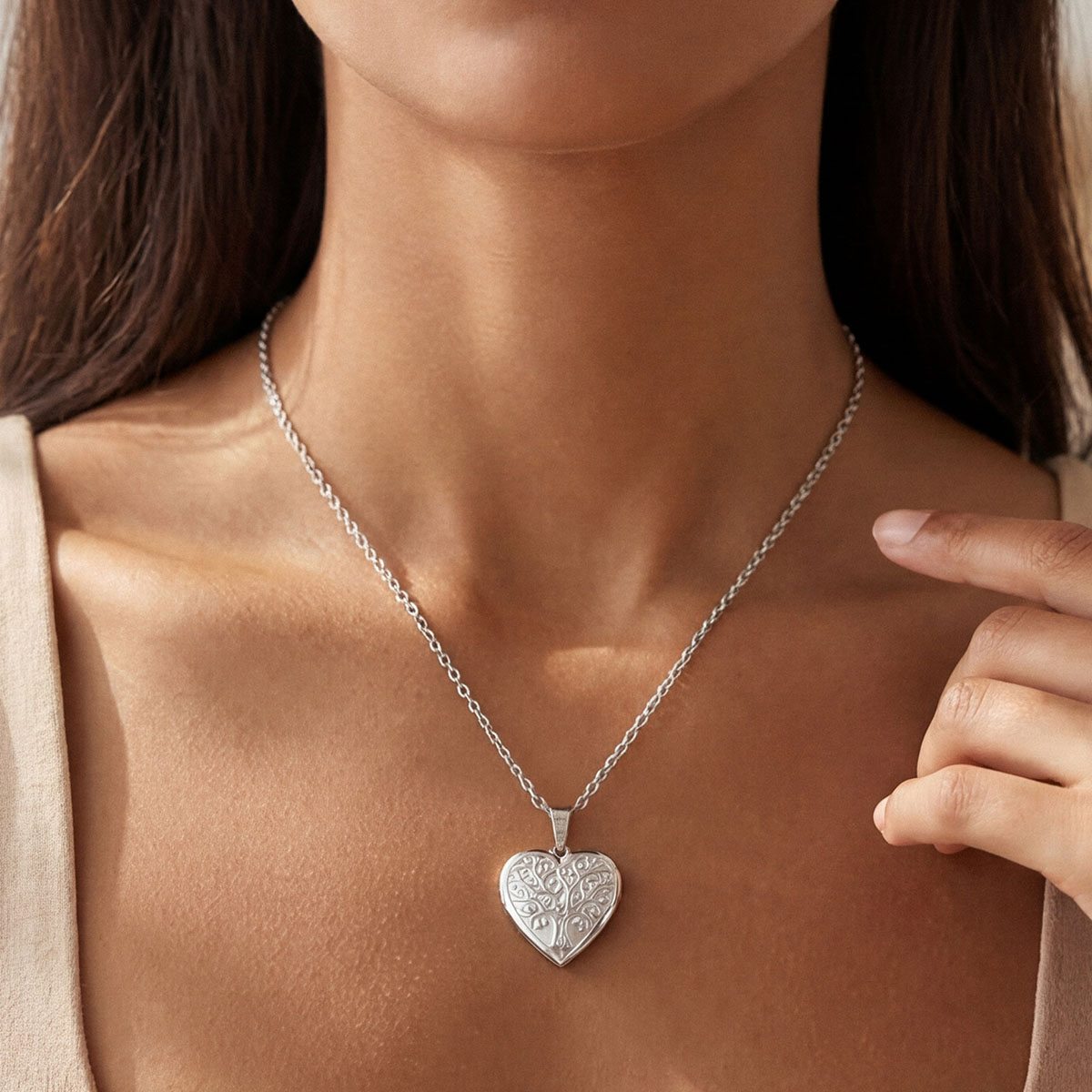 A Woman Wearing Custom Tree of Life Hearts Locket Necklace with Pictures