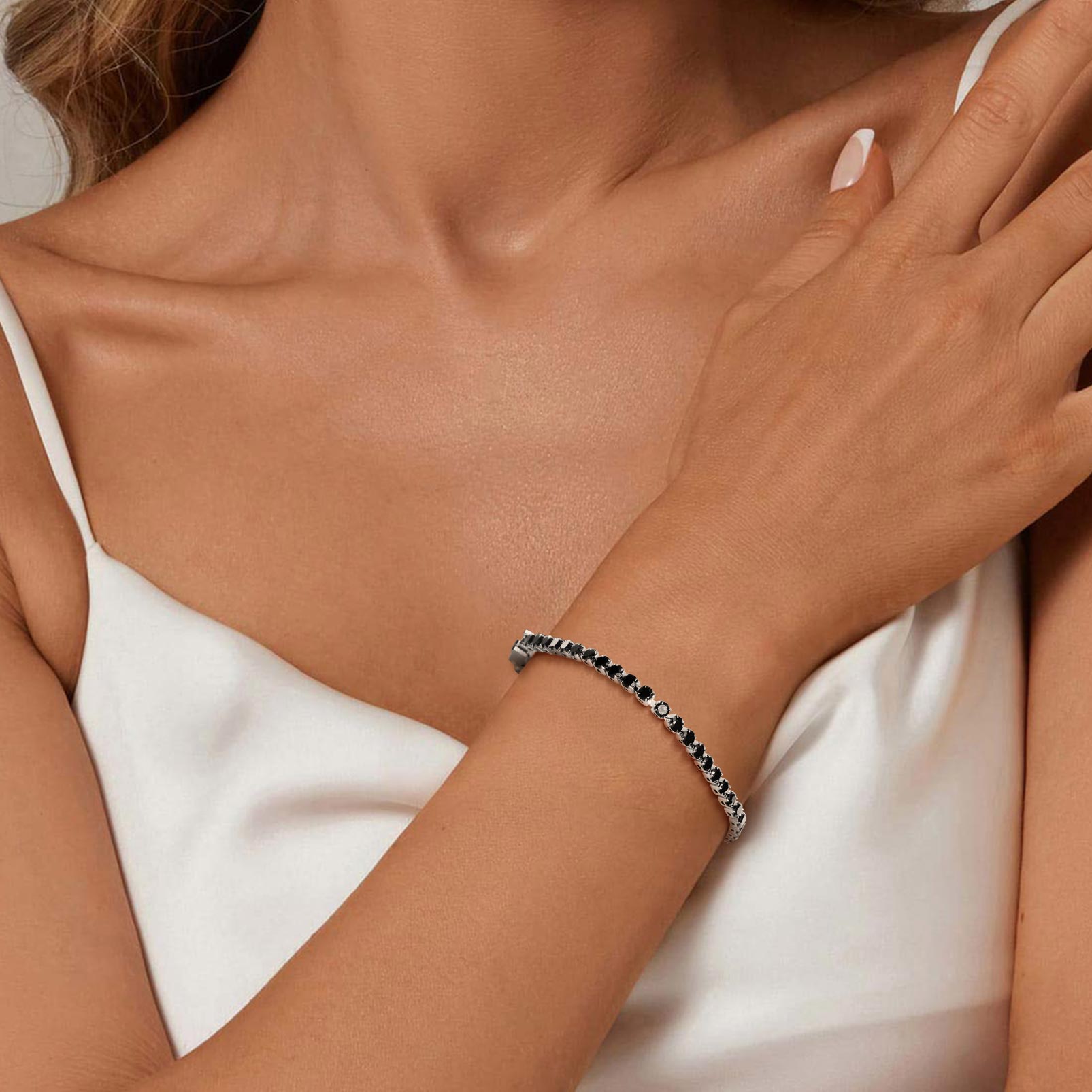 A Woman Wearing Dainty Black Cubic Zirconia Tennis Bracelet