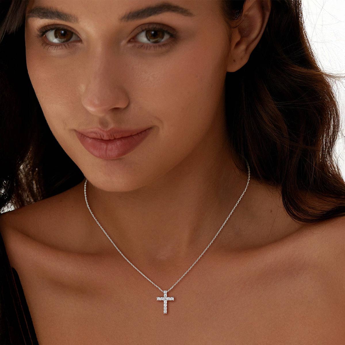 A Woman Wearing Dainty Cross Necklace for Women