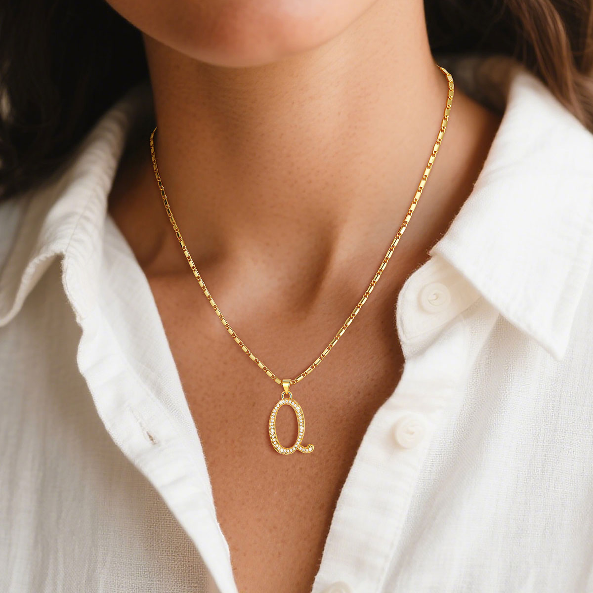 A Woman Wearing Dainty Cubic Zirconia Initial Necklace