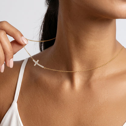 A Woman Wearing Dainty Cubic Zirconia Sideways Cross Necklace for Women 