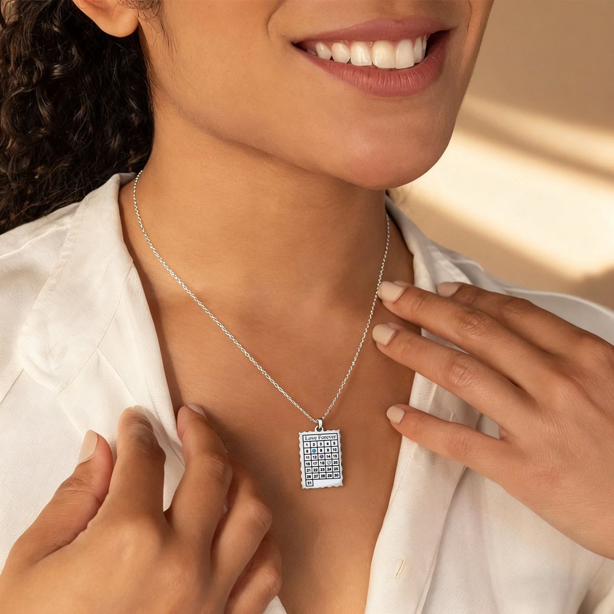 A Woman Wearing Date Calendar Necklace with Birthstone