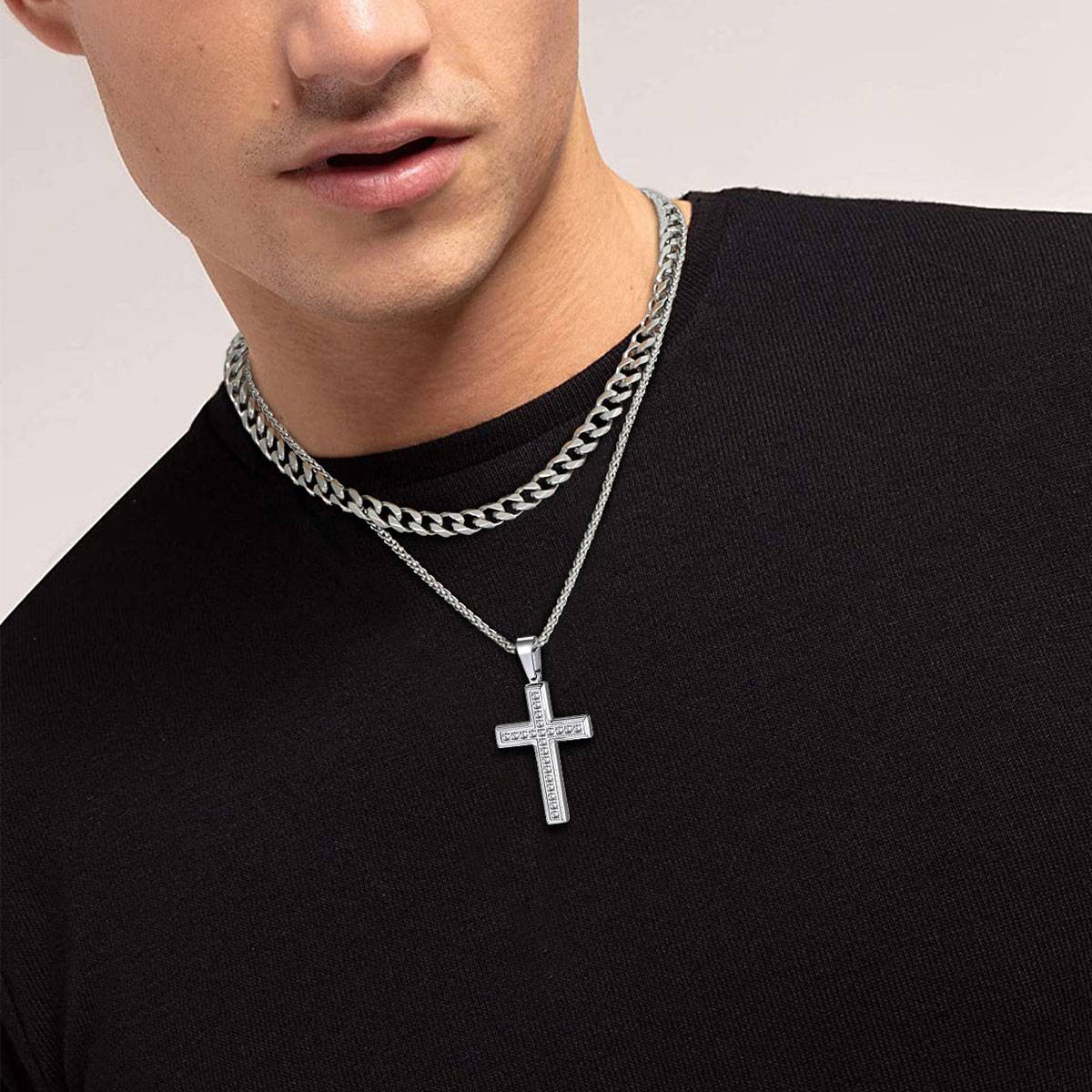 A Woman Wearing Engraved Cubic Zirconia Cross Necklace