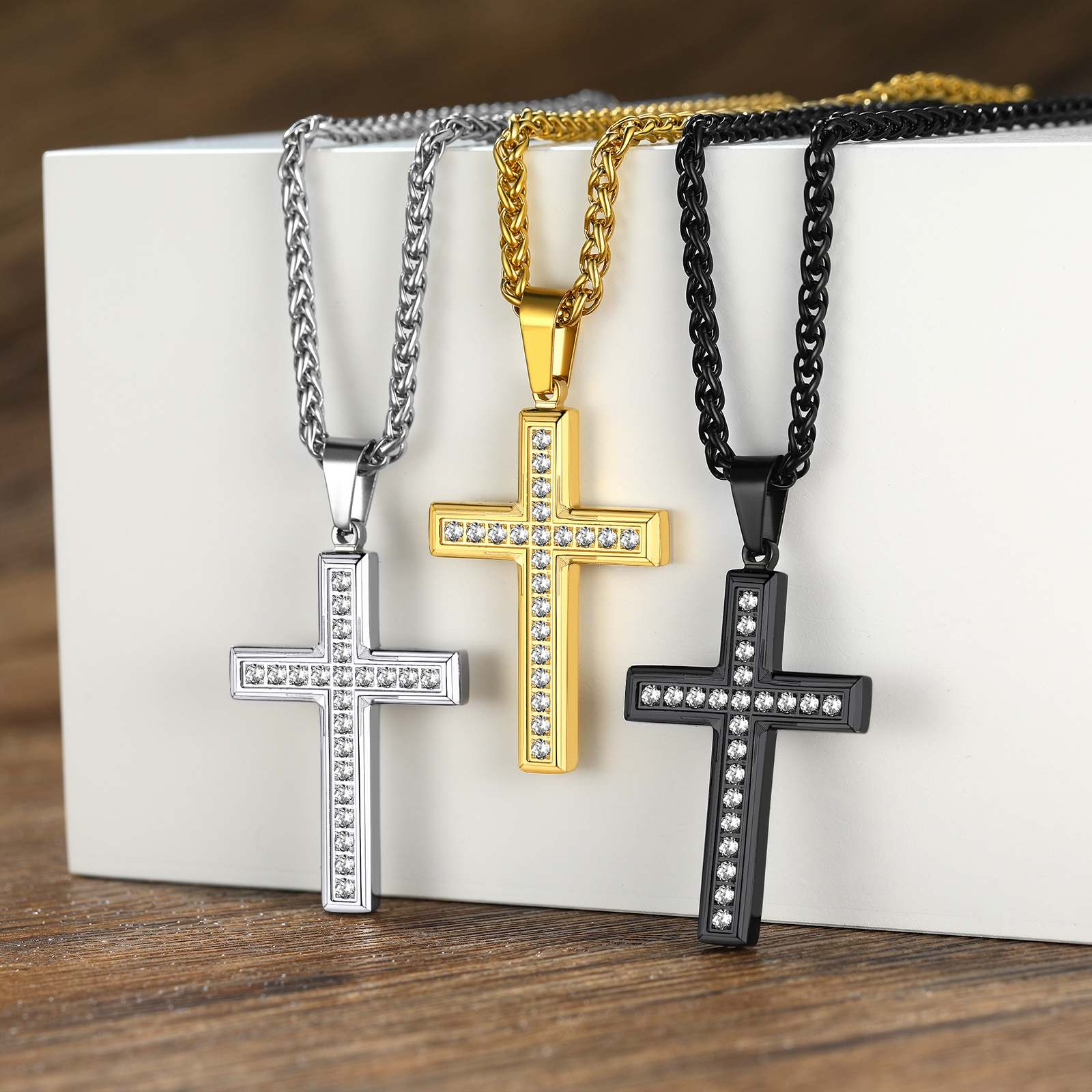 A Woman Wearing Engraved Cubic Zirconia Cross Necklace in different color