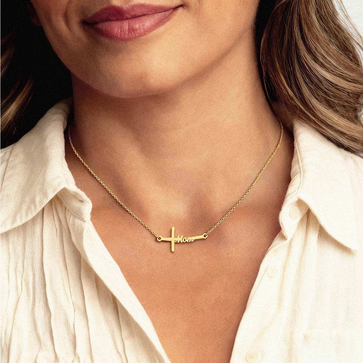 A Woman Wearing Gold Plated Sideways Cross Mom Necklace