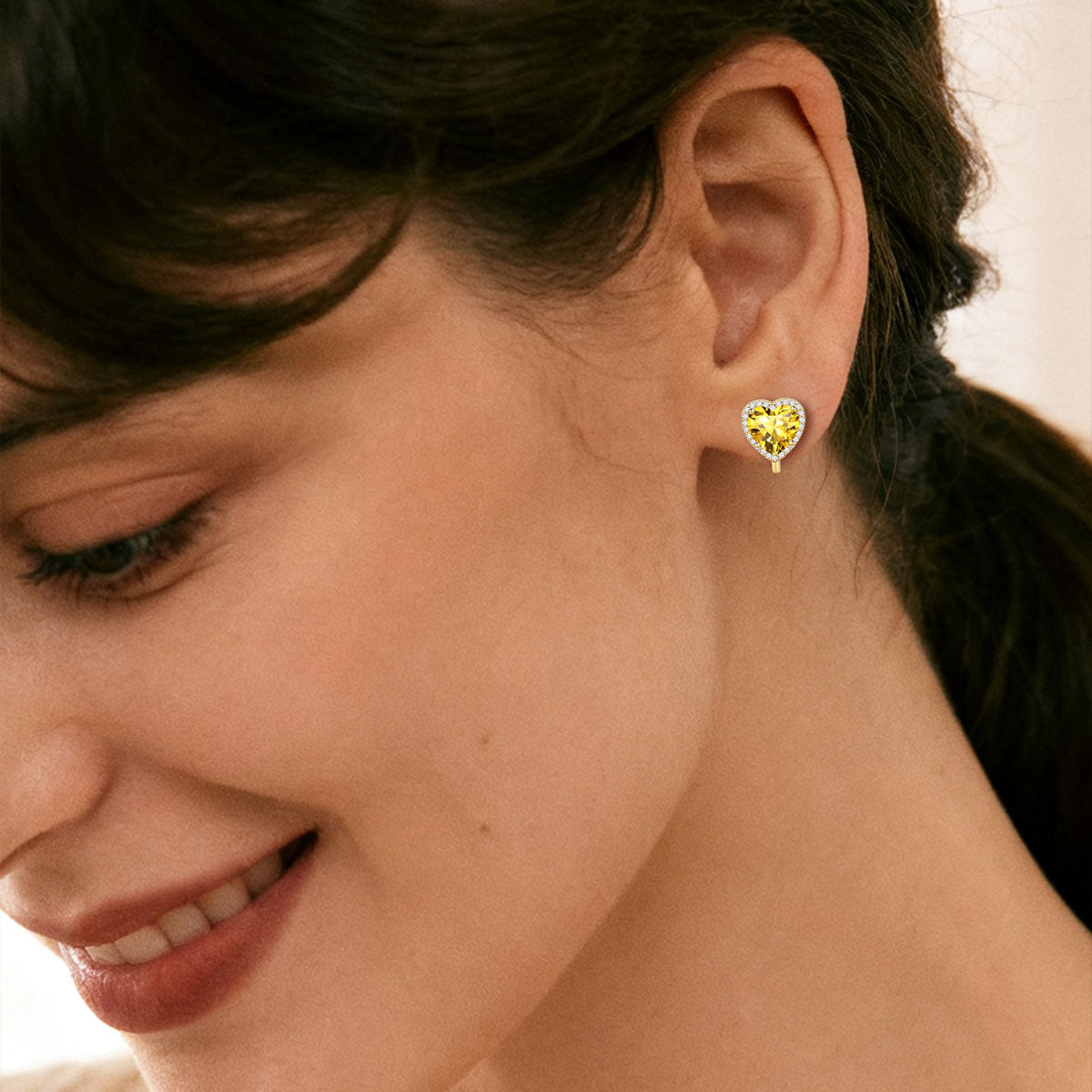A Woman Wearing Heart Birthstone Clip-on Earrings Non-Pierced Studs