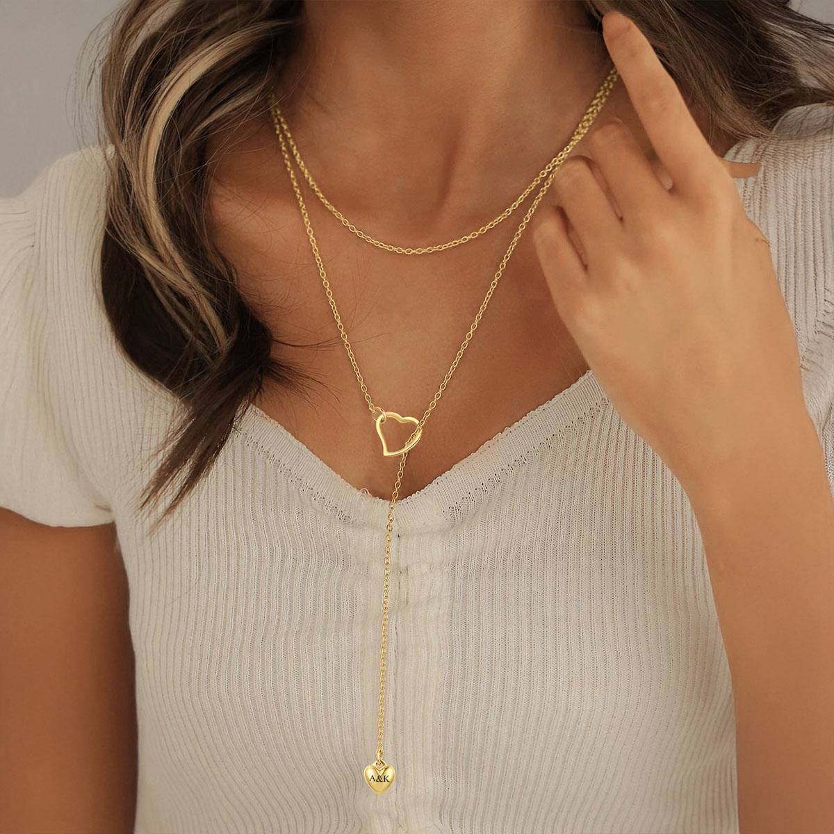A Woman Wearing Heart Lariat Y Necklaces Adjustable Long Chain Necklace Gold Plated