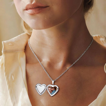 A Woman Wearing Heart Locket Necklace