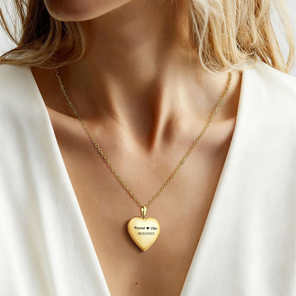A Woman Wearing Heart Locket Necklace with Pictures
