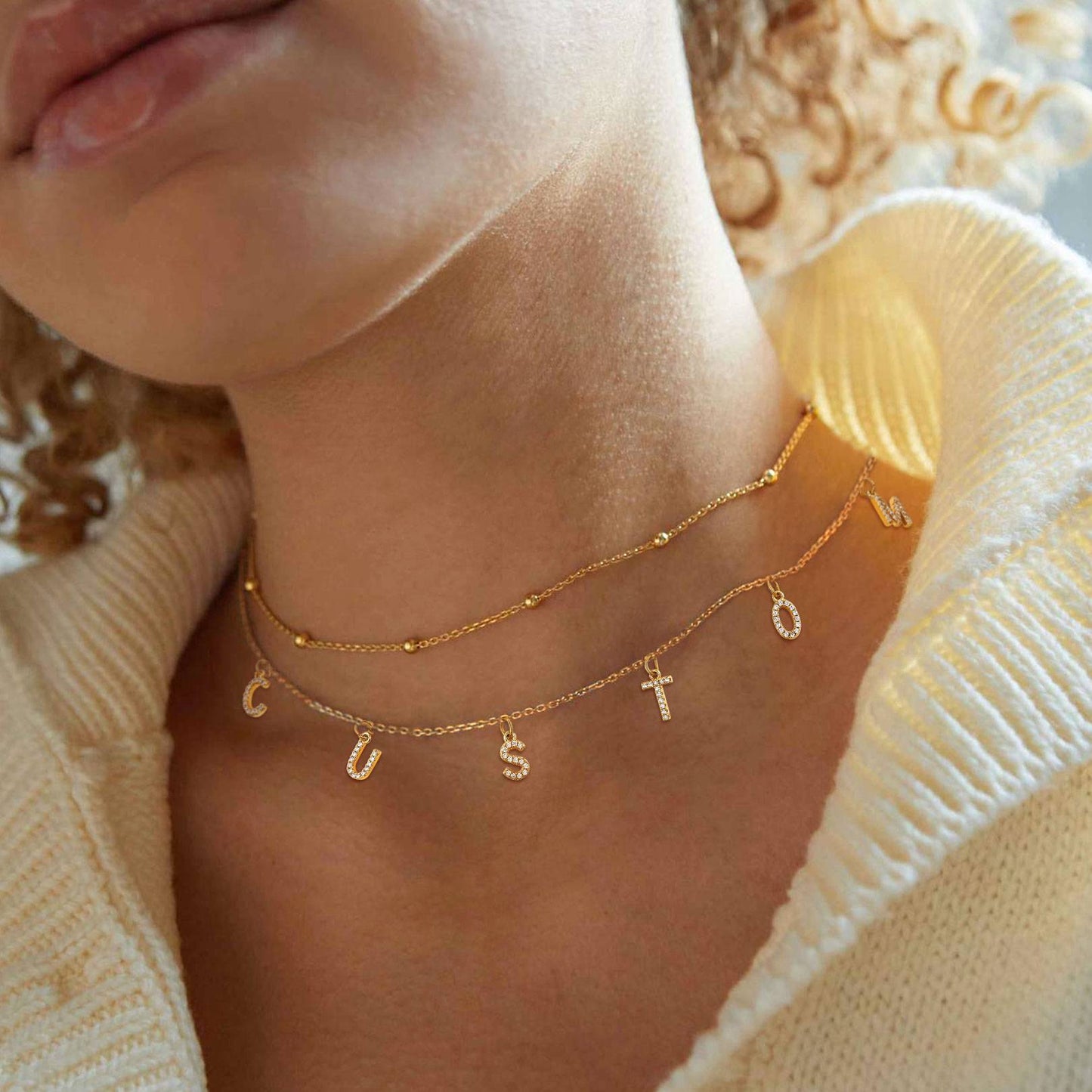 A Woman Wearing Initial Name Choker Necklace