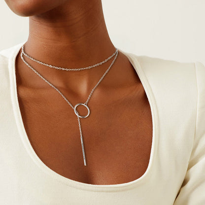 A Woman Wearing Lariat Open Circle Y Necklaces Bar Long Necklaces