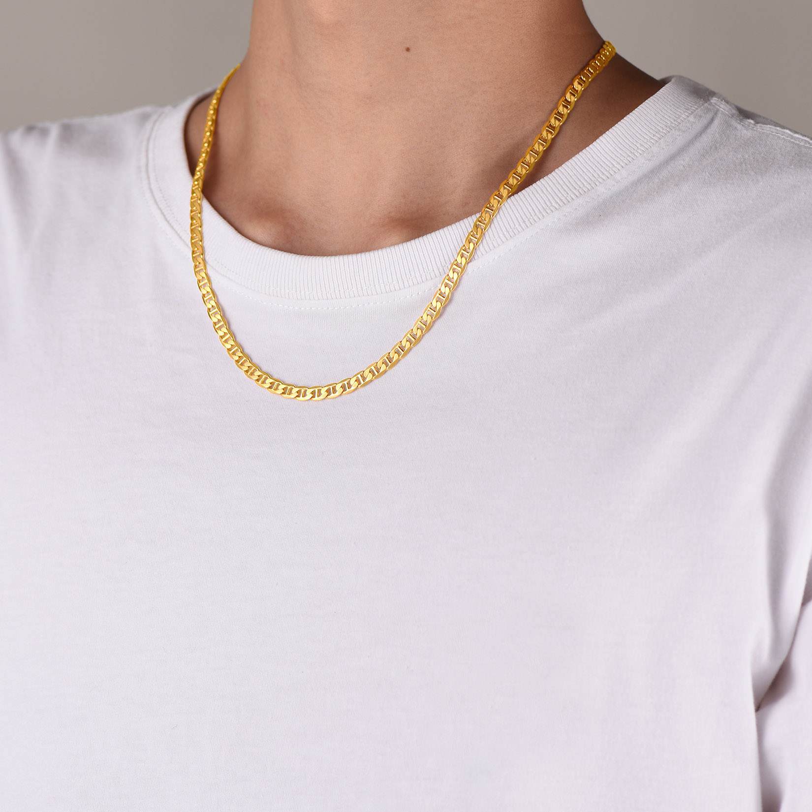 A Woman Wearing Mariner Necklace